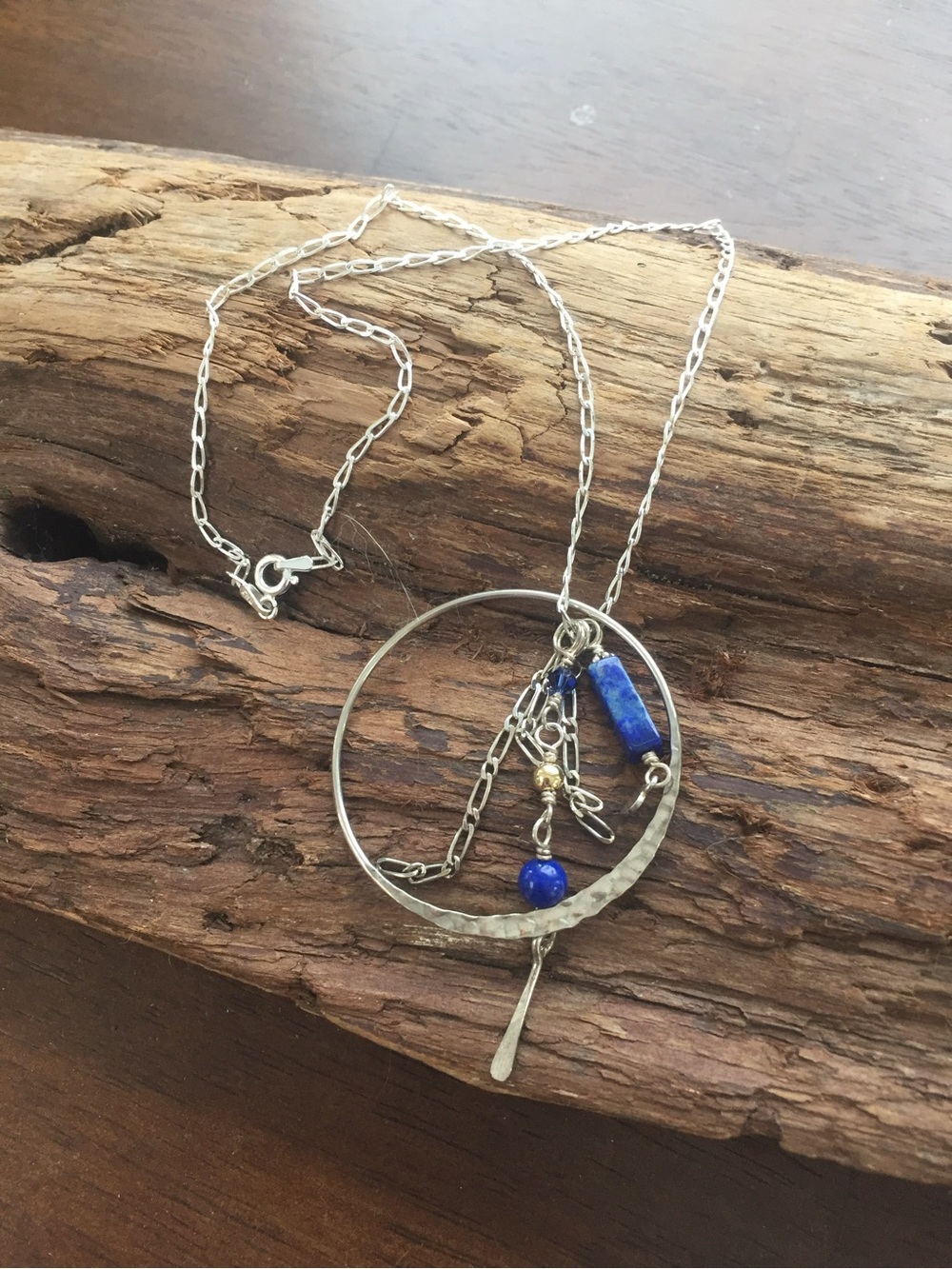 Handcrafted Silver Circle Pendant Necklace with Lapis Accent